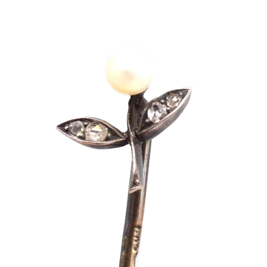 Austro-Hungarian 14ct gold floral tie pin with pearl and rose-cut diamond leaves.