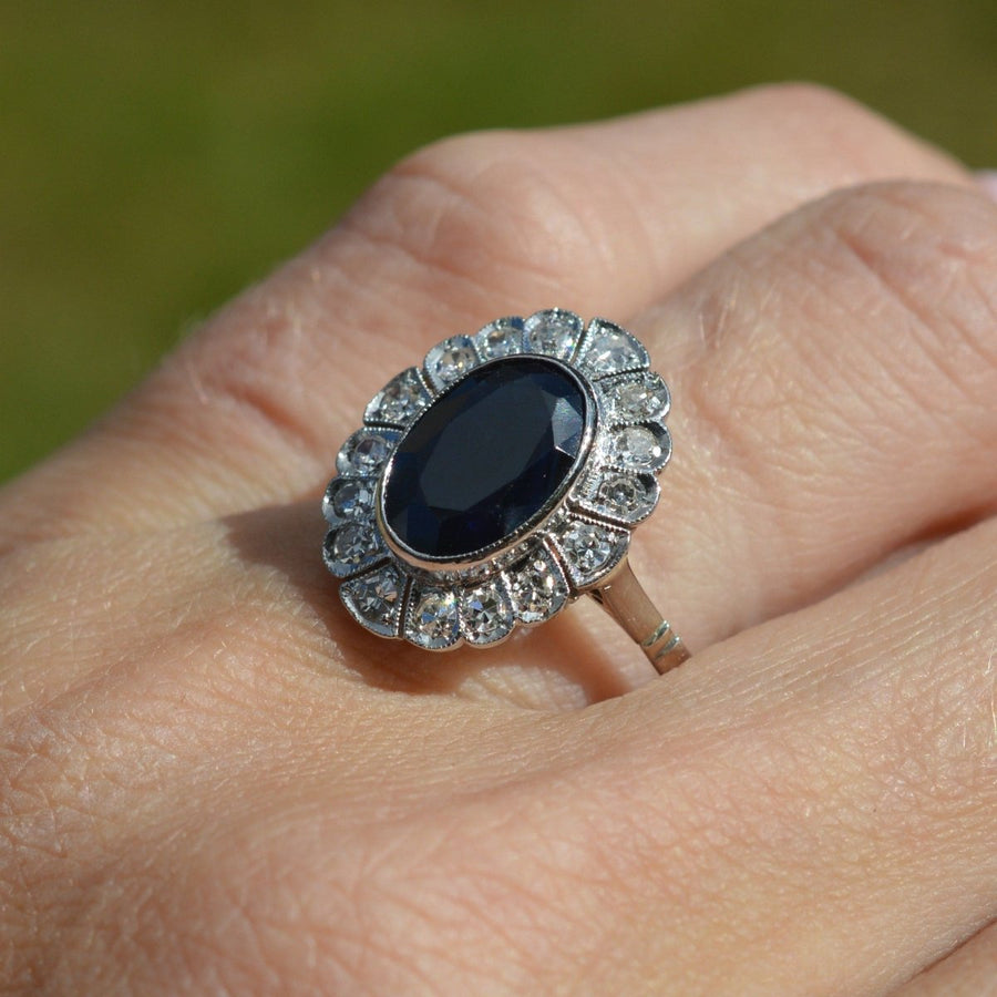Early 20th Century Dark Blue Sapphire and Diamond Cluster Ring