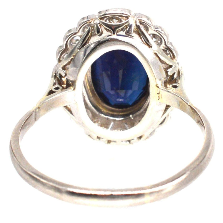Early 20th Century Dark Blue Sapphire and Diamond Cluster Ring