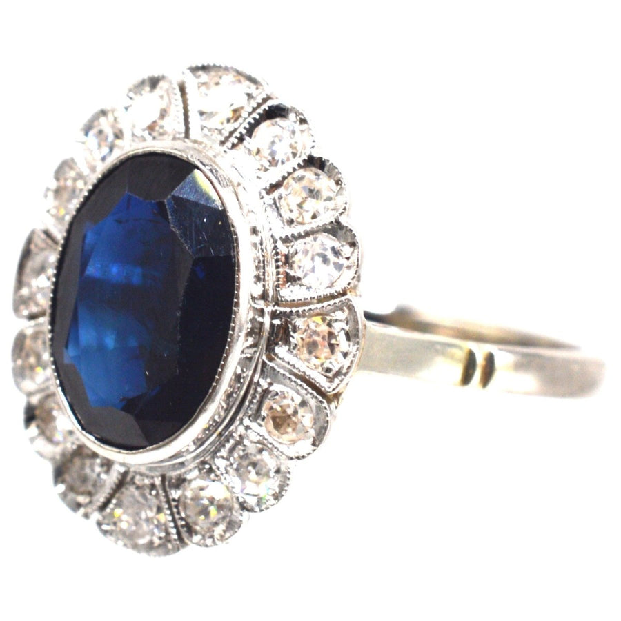 Early 20th Century Dark Blue Sapphire and Diamond Cluster Ring