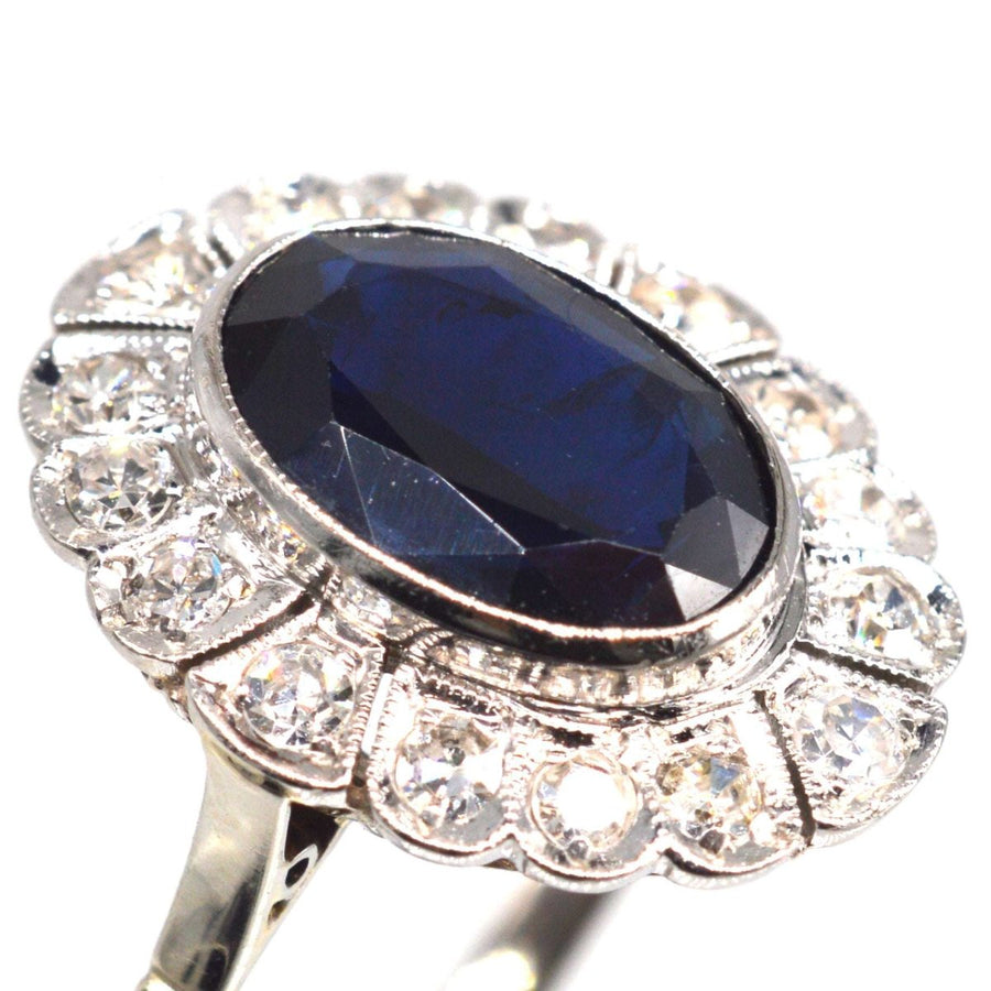 Early 20th Century Dark Blue Sapphire and Diamond Cluster Ring