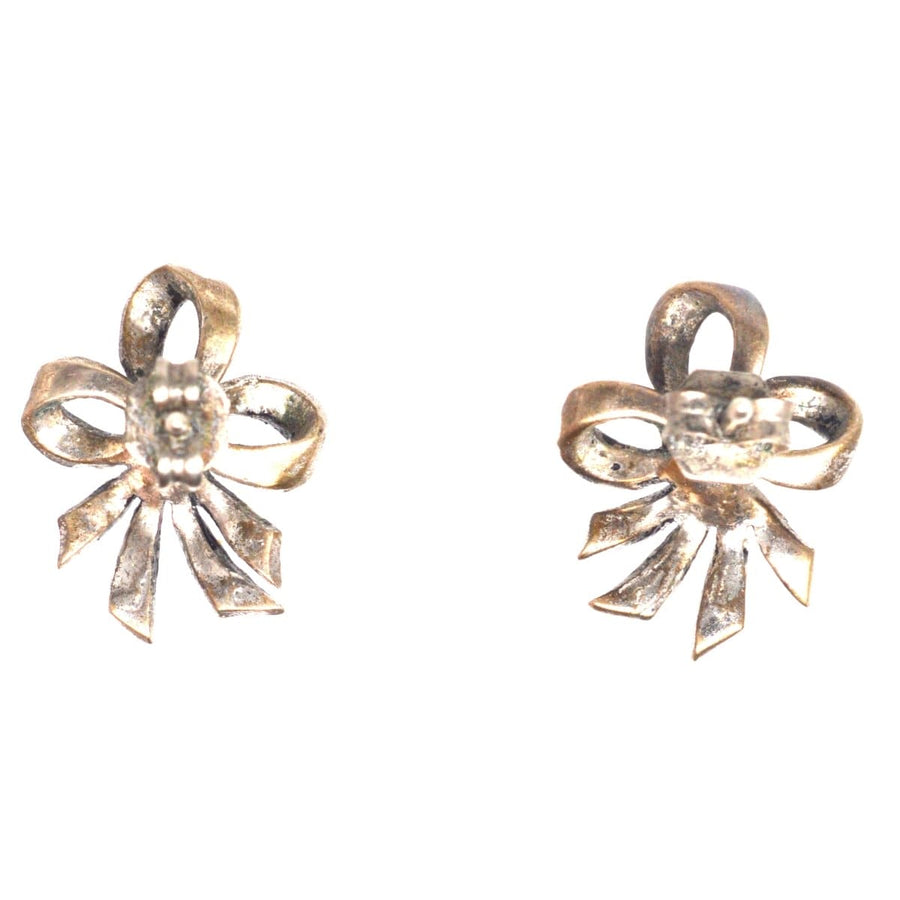 Edwardian silver marcasite bow earrings showcasing vintage elegance and intricate design, perfect for any occasion.