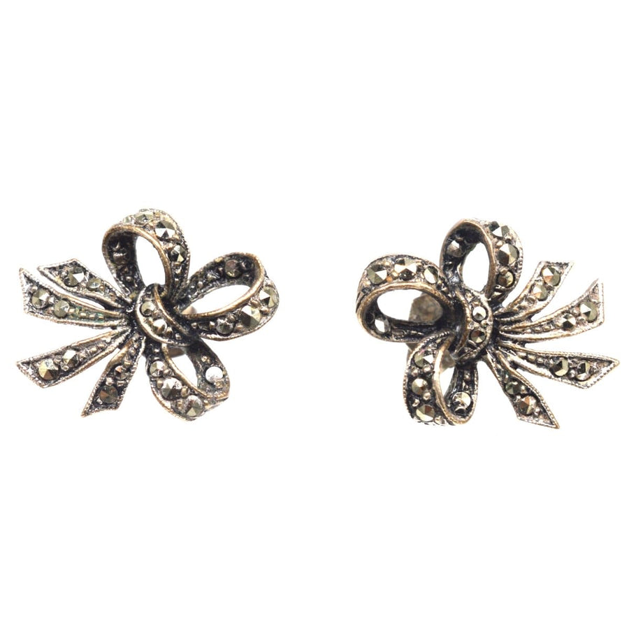 Edwardian silver marcasite bow earrings showcasing elegant vintage design and exquisite craftsmanship.