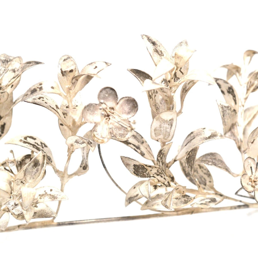 Mid 19th century silver leaf tiara featuring floral designs and intricate craftsmanship for bridal elegance.