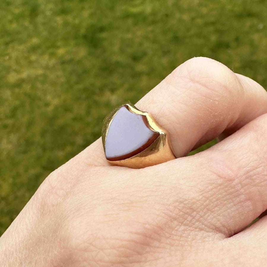 Victorian 18ct gold shield signet ring with carnelian stone, showcasing elegant craftsmanship and timeless design.