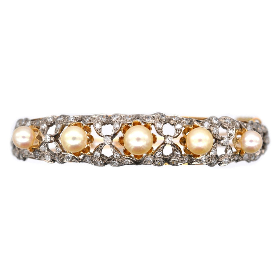 1940s 18ct gold bangle with cultured pearls and diamonds, showcasing a stunning vintage design in fine jewelry.