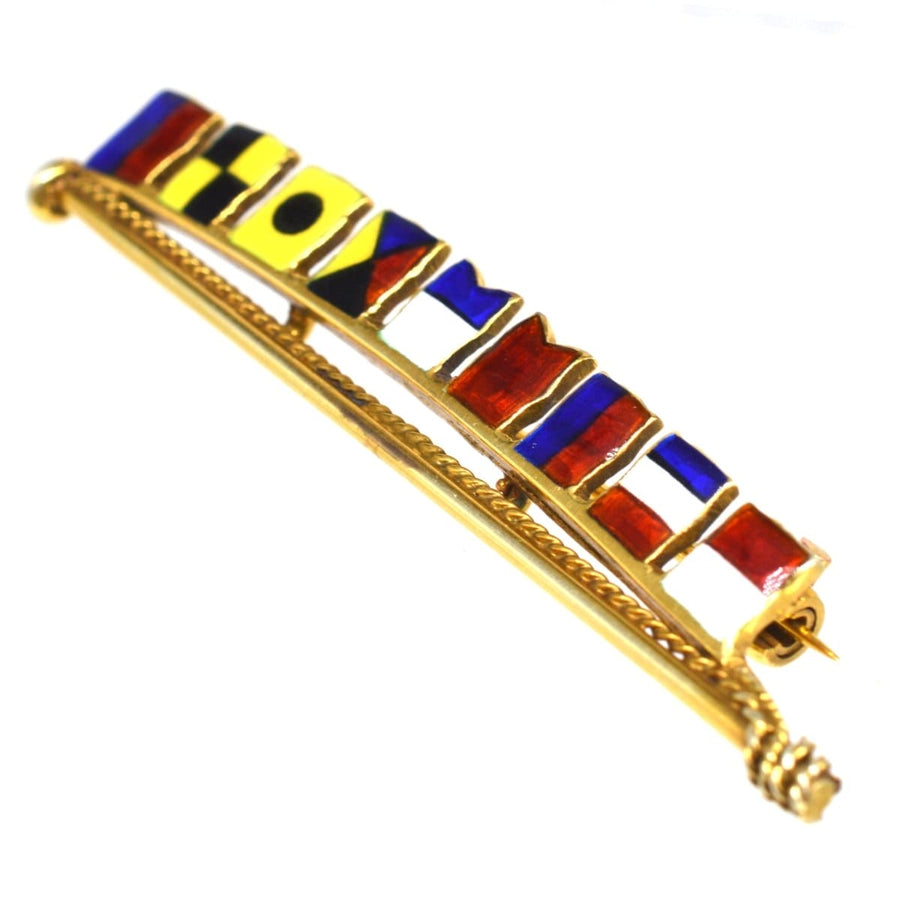 1970s vintage 9ct gold nautical flag brooch spelling Elizabeth, featuring colorful enamel designs.