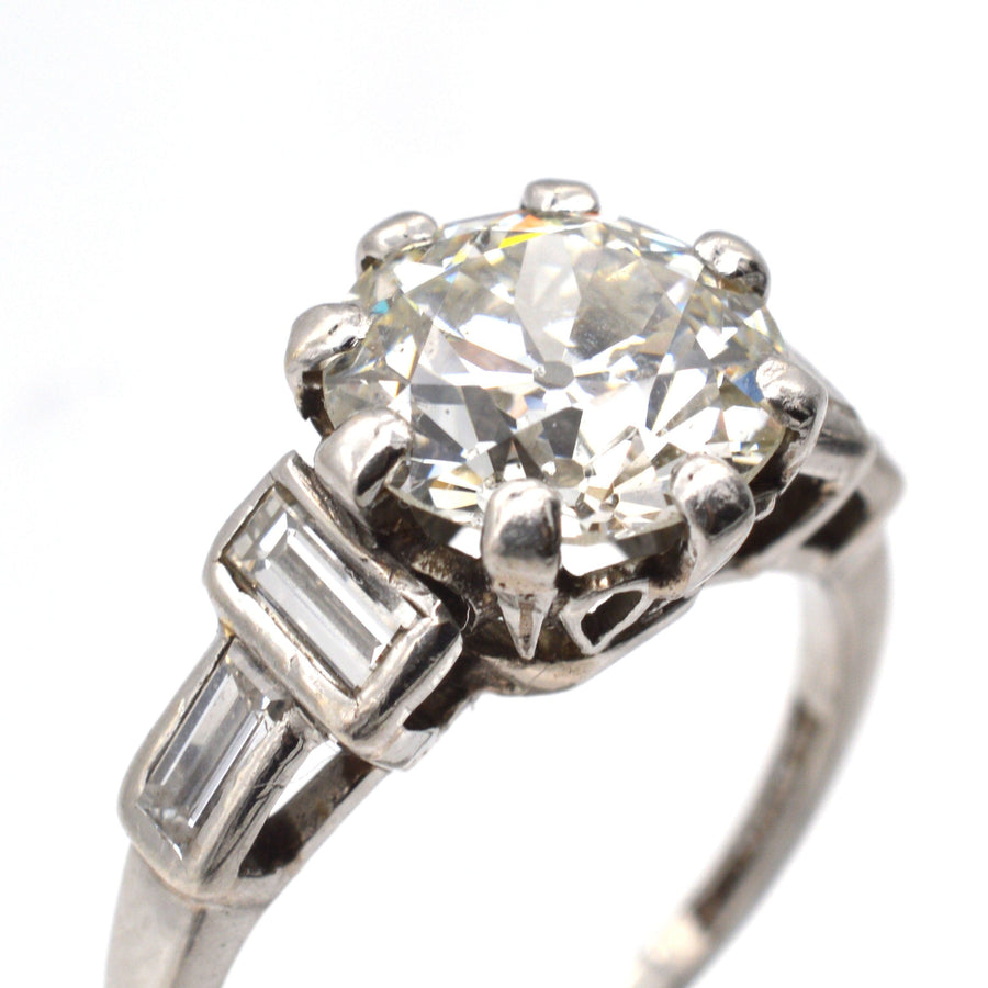 Large Art Deco Platinum 3 Carat Old European Cut Diamond Solitaire Ring with Baguette Diamond Shoulders | Parkin and Gerrish | Antique & Vintage Jewellery