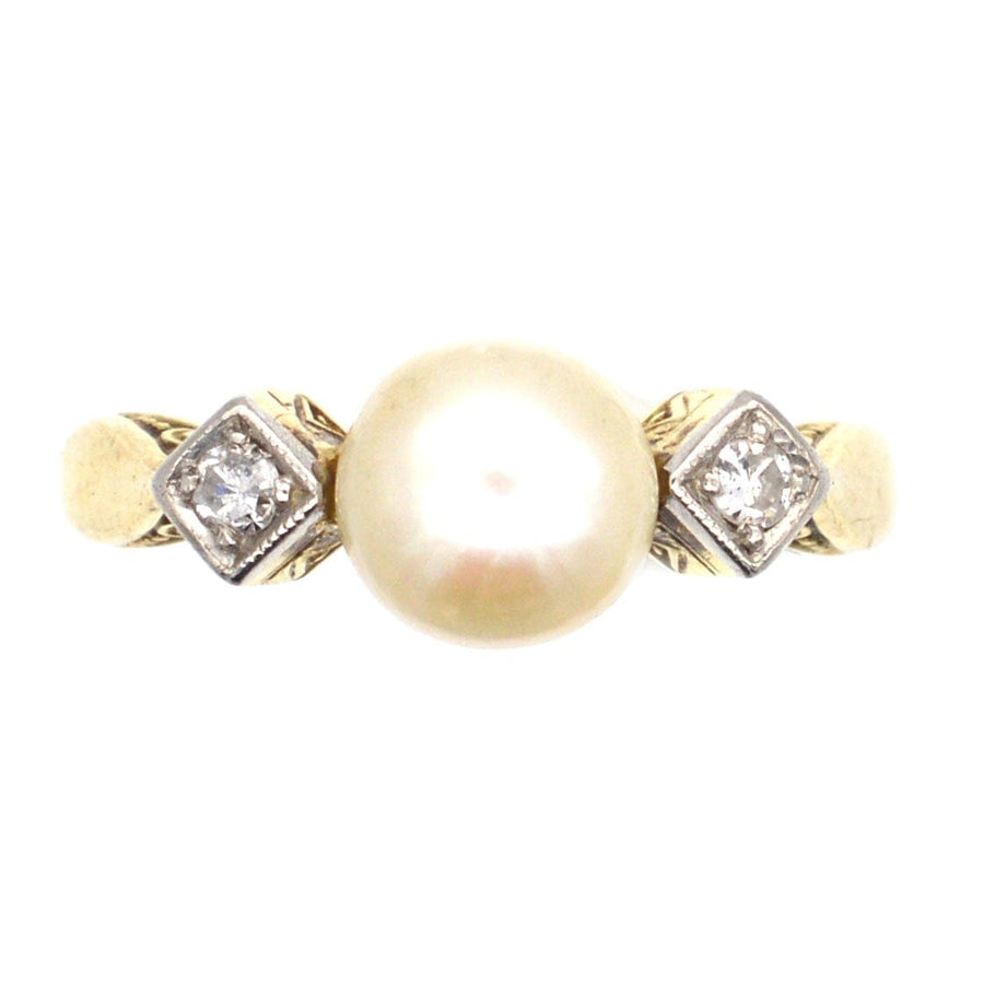 Art Deco 14ct gold ring featuring a cultured pearl and diamond accents, perfect for engagement or special occasions.
