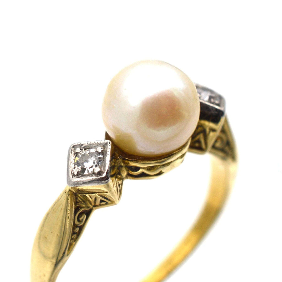 Art Deco 14ct gold ring featuring a cultured pearl and diamond accents, circa 1930s, elegant design for engagement.