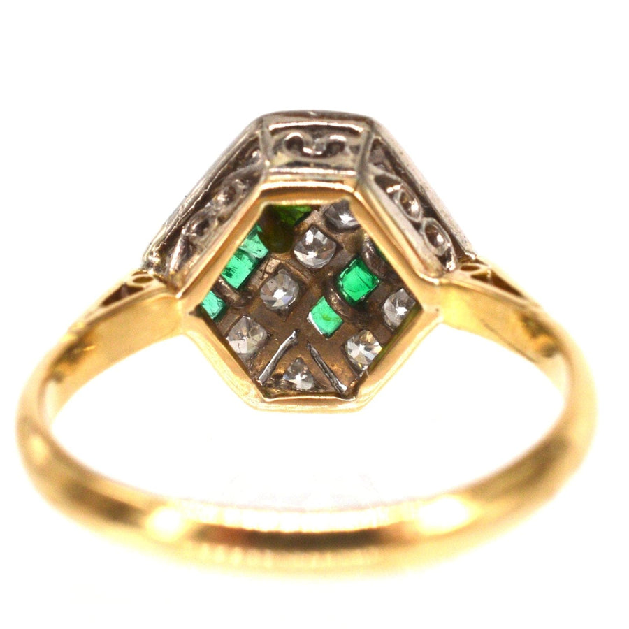 Art Deco 18ct gold and platinum hexagonal ring featuring emeralds and diamonds, showcasing exquisite geometric design.
