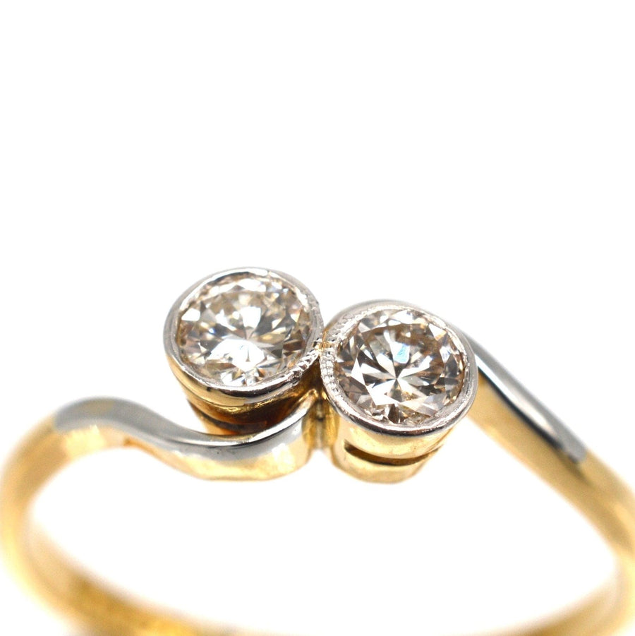 Art Deco 18ct gold and platinum Toi et Moi crossover ring with two stunning diamond stones.