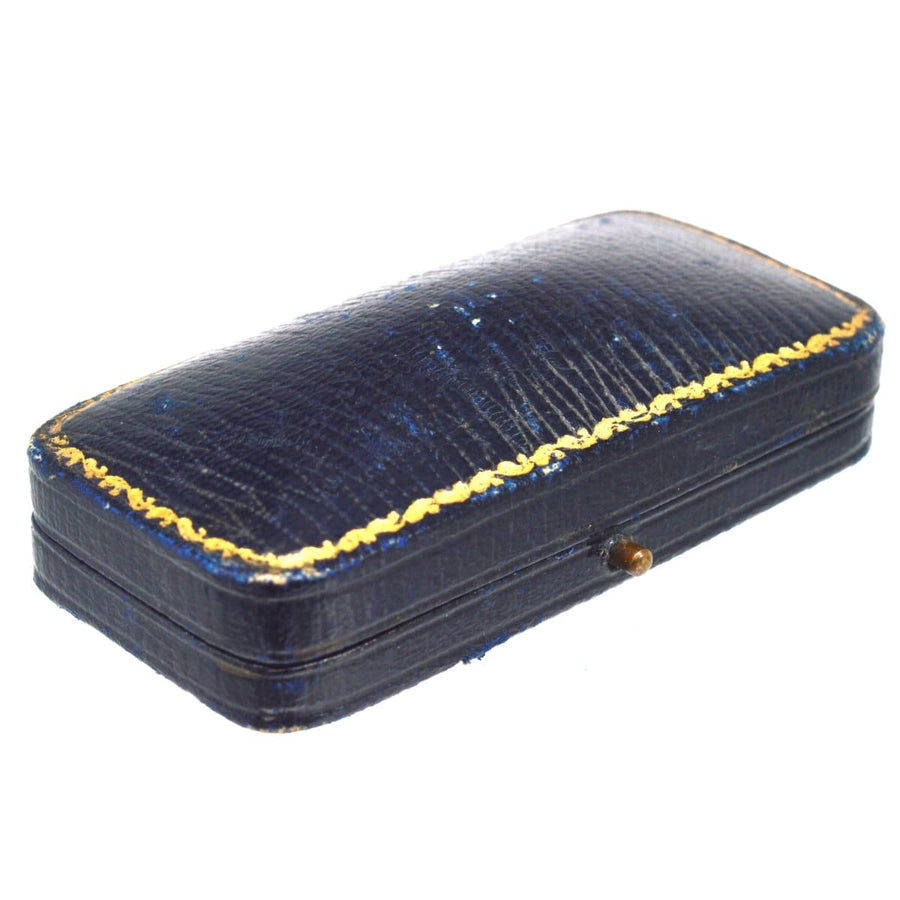 Vintage blue leather box with gold trim, perfect for storing jewelry or keepsakes.