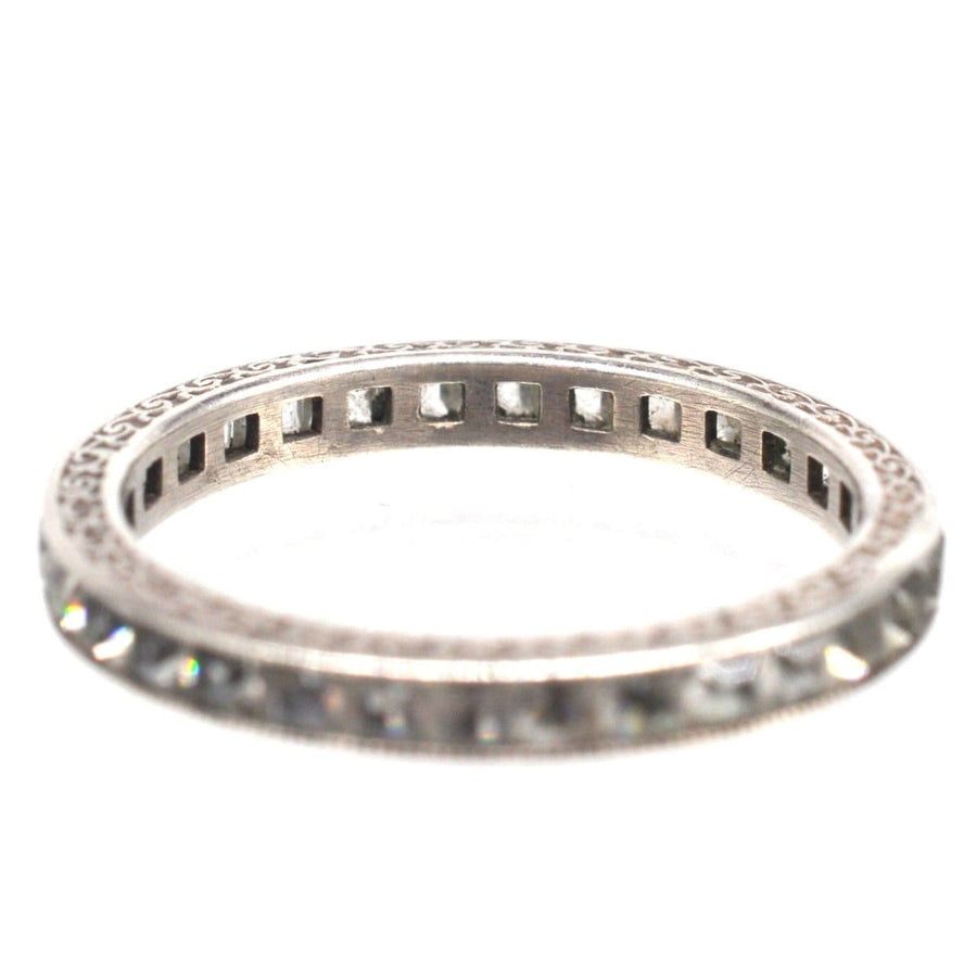 Art Deco silver paste eternity ring showcasing intricate design, a timeless symbol of love and commitment.