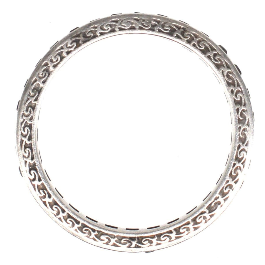 Art Deco silver paste eternity ring featuring intricate designs, perfect as an engagement or wedding ring.
