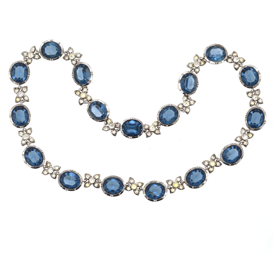 Art Deco silver necklace featuring blue sapphire pastes and diamond paste links, showcasing a stunning vintage design.