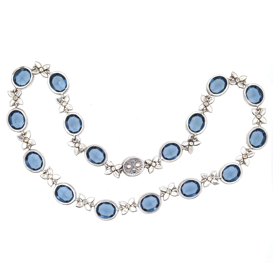 Art Deco silver necklace with blue sapphire paste stones and diamond paste links for a stunning vintage look.