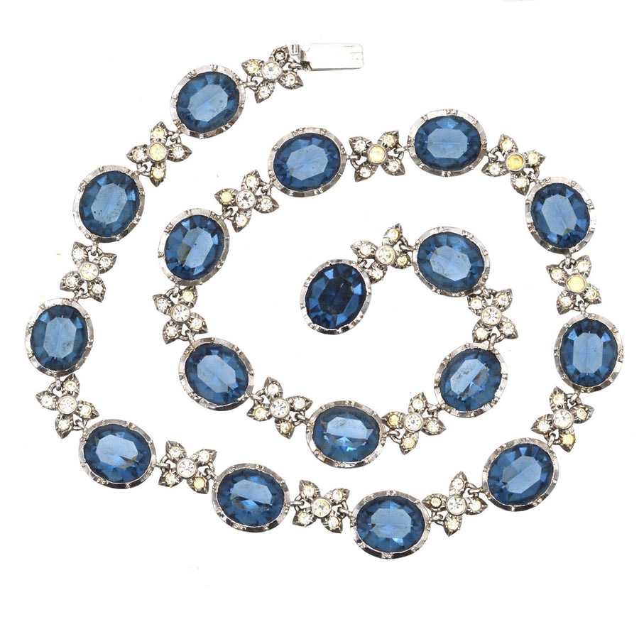 Art Deco silver necklace with blue sapphire pastes and diamond paste links, showcasing elegance and vintage charm.