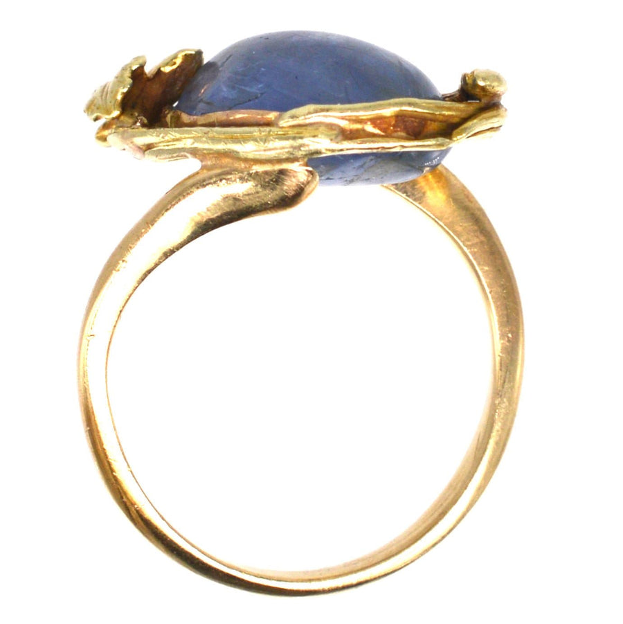 Art Nouveau 18ct gold double cabochon kyanite ring featuring delicate flower and bud design.