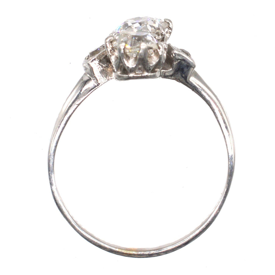 Belle Époque platinum and diamond 'Toi et Moi' crossover ring showcasing two sparkling diamonds.