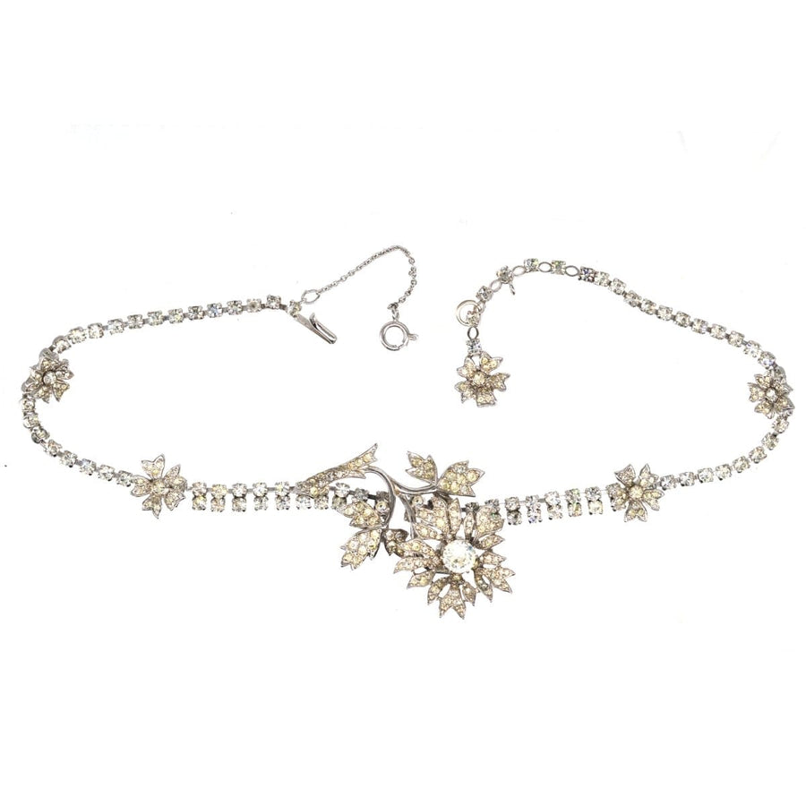 Christian Dior 1950s necklace featuring 'En Tremblant' floral design with clear paste stones, rhodium plated base metal.