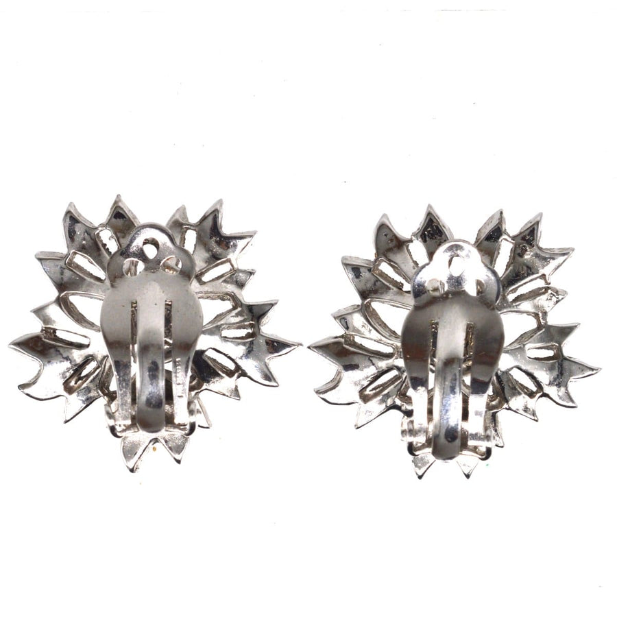 Christian Dior 1950s clip-on earrings with flower design and white paste stones, antique charm in rhodium plated metal.