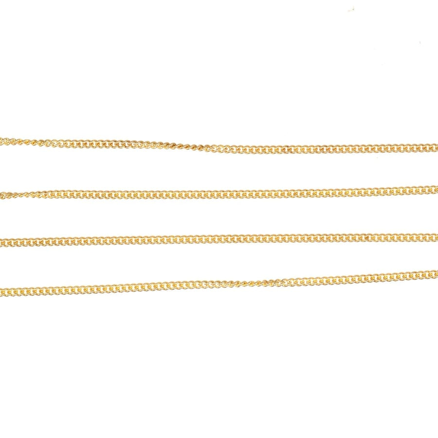Contemporary 9ct gold curb chains displayed, showcasing polished finish and classic design, available in 20"/50cm.