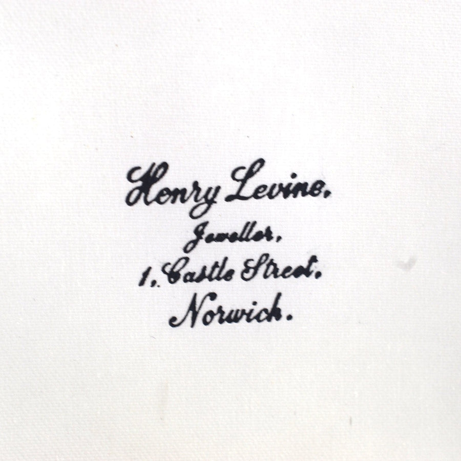 Signature of Henry Levine, jeweller located at 1 Castle Street, Norwich, on a white background.