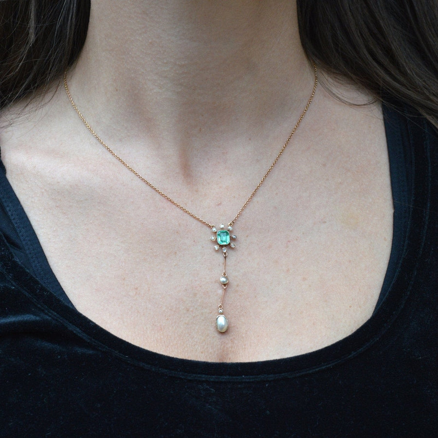 Edwardian 15ct gold emerald and diamond cluster pendant with natural pearl drop on gold chain.