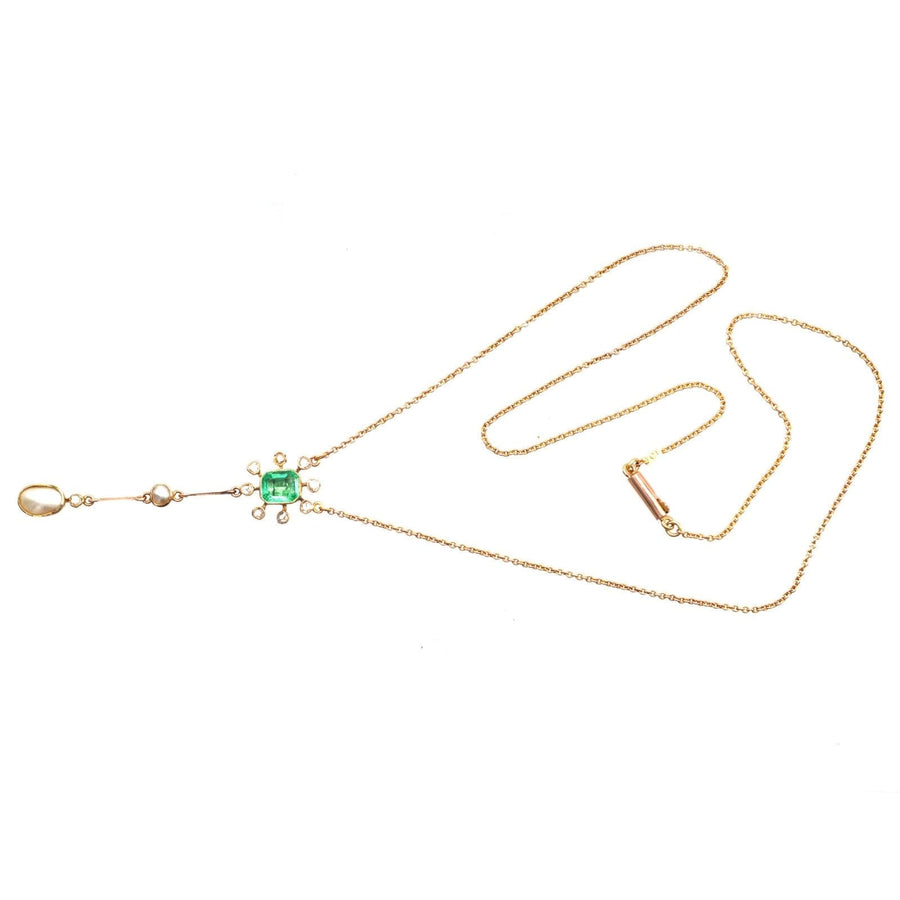 Edwardian 15ct gold pendant featuring emerald, rose cut diamonds, and natural pearls on a 9ct gold chain.