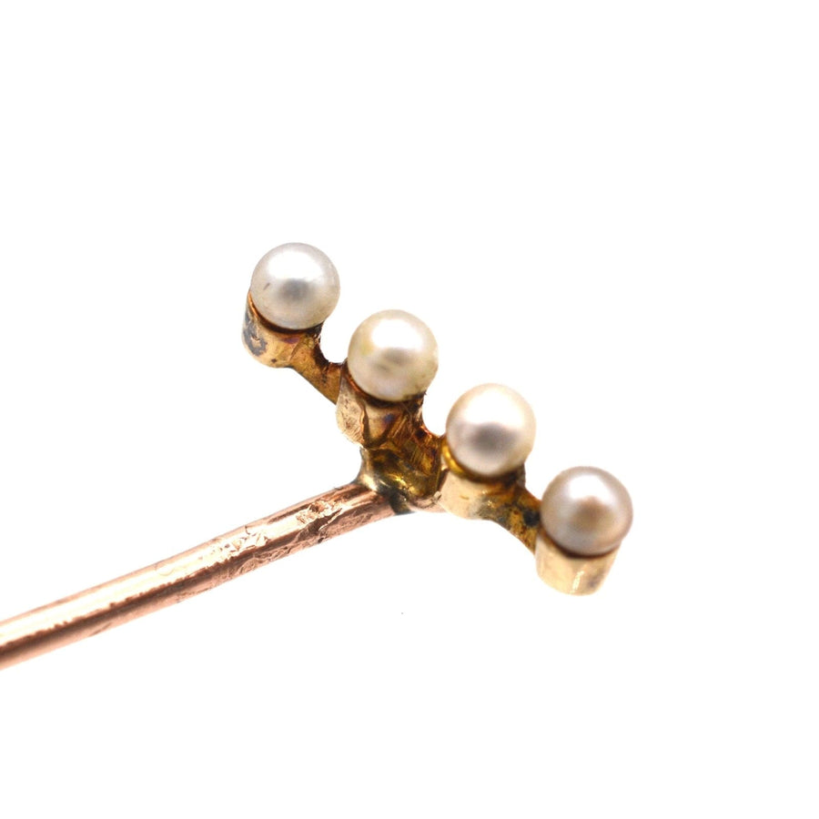 Elegant Edwardian 15ct gold tie pin featuring four natural pearls on a diagonal bar design, perfect for silk ties.