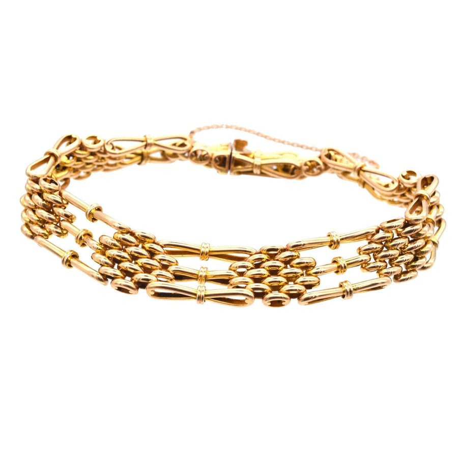 Edwardian 15ct gold gate bracelet, classic design from circa 1910, perfect for both formal and casual wear.