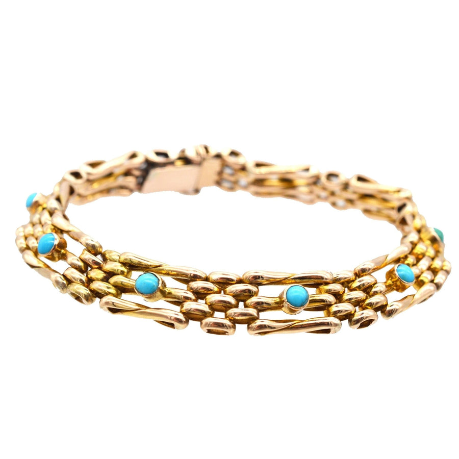 Edwardian 15ct gold gate bracelet featuring turquoise stones, circa 1910, elegant for both formal and casual wear.