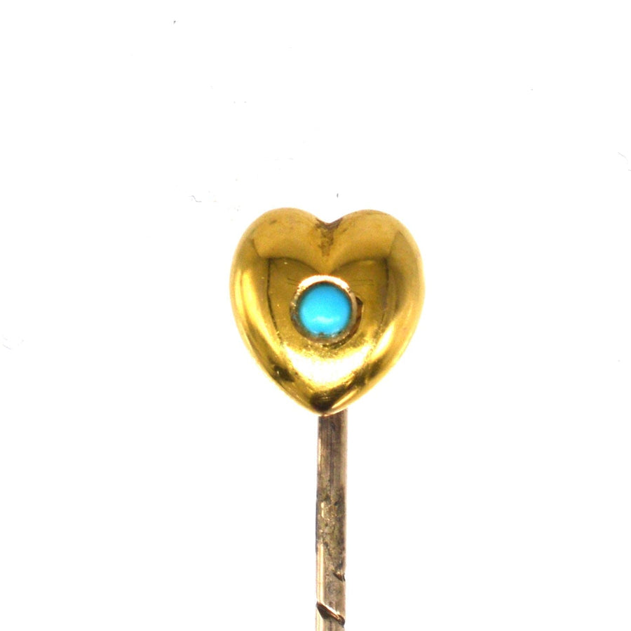 Edwardian 15ct gold heart tie pin with turquoise center, symbolizing luck and protection, perfect for stylish ties.