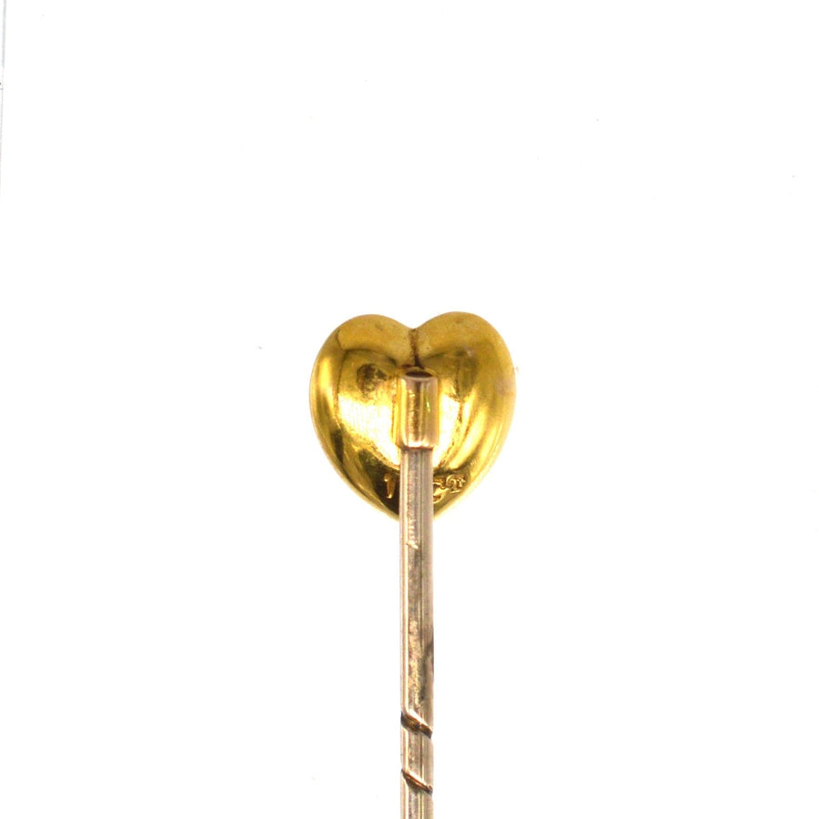 15ct gold heart tie pin featuring a turquoise stone, perfect for stylish occasions and December celebrations.
