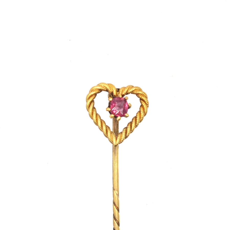 Edwardian 15ct gold knot heart tie pin featuring a natural ruby, perfect for gifts or formal occasions.