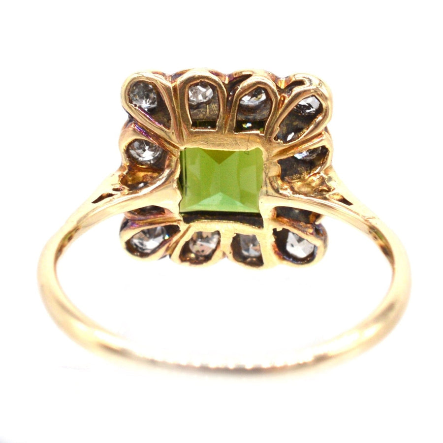 Edwardian 18ct gold and Platinum ring featuring a green tourmaline and diamond cluster, perfect for an engagement.