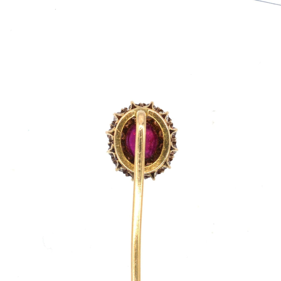 Edwardian 18ct gold tie pin featuring a stunning pigeon blood ruby and diamond cluster, circa 1900.