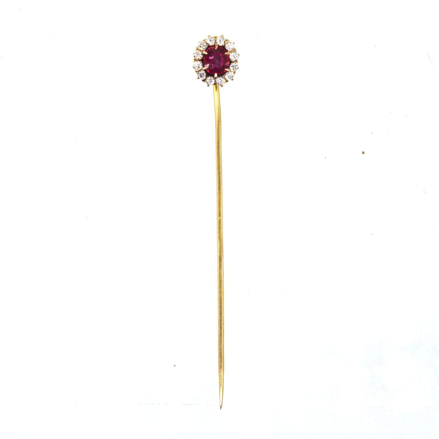 Edwardian 18ct gold tie pin featuring a vibrant pigeon blood Burma ruby surrounded by diamonds.