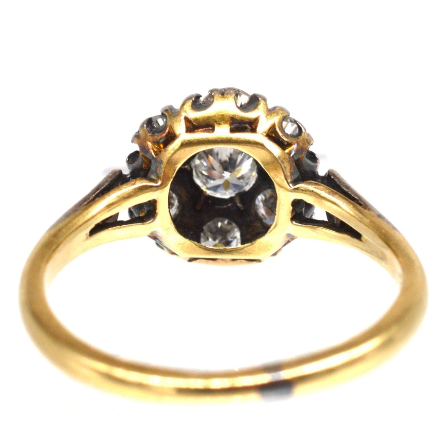 Edwardian 18ct gold and platinum diamond cluster ring with approx. 0.70 carats, perfect for engagement.