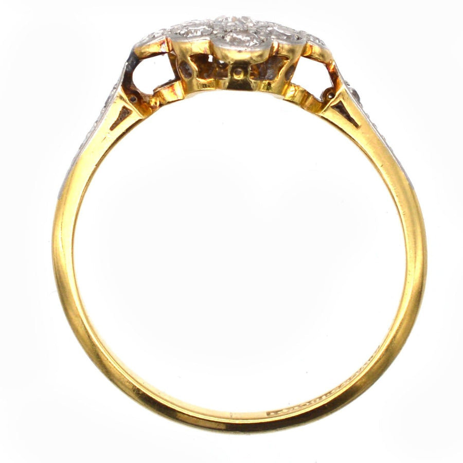 Edwardian 18ct gold and platinum diamond cluster ring showcasing elegant diamond-shaped diamond cluster.