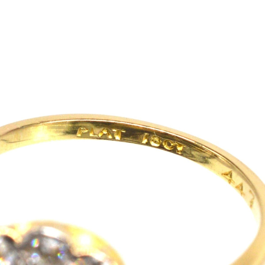 Close-up of an Edwardian 18ct gold and platinum ring showcasing the inner hallmark.