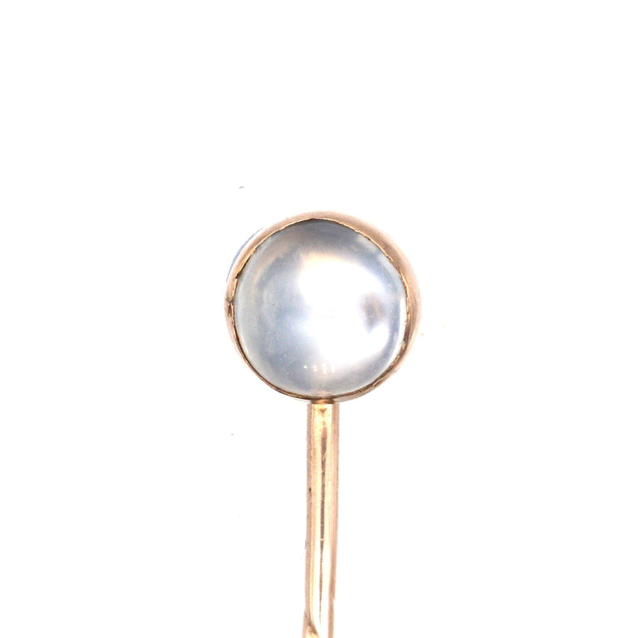 18ct gold tie pin featuring a stunning moonstone, showcasing its bluey grey glow, dating from around 1910.