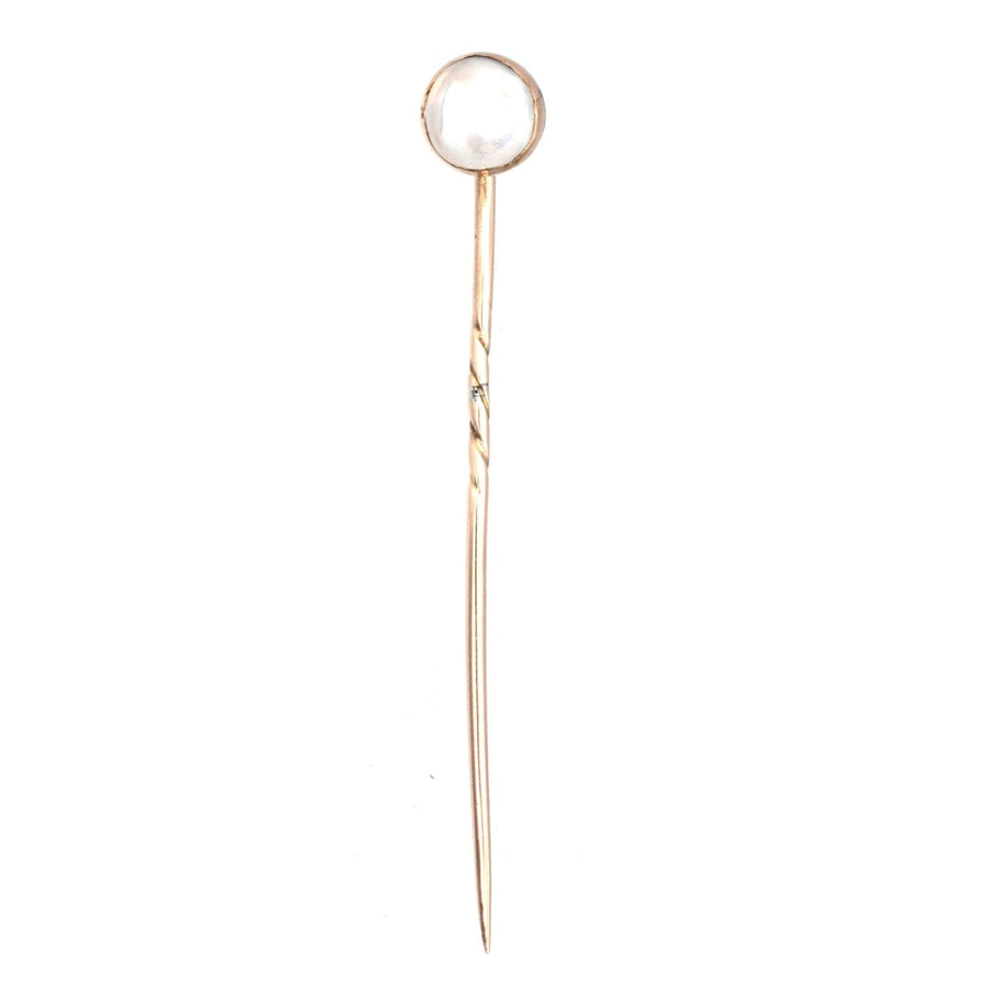 Edwardian 18ct gold tie pin featuring a moonstone, showcasing a vintage design from around 1910.