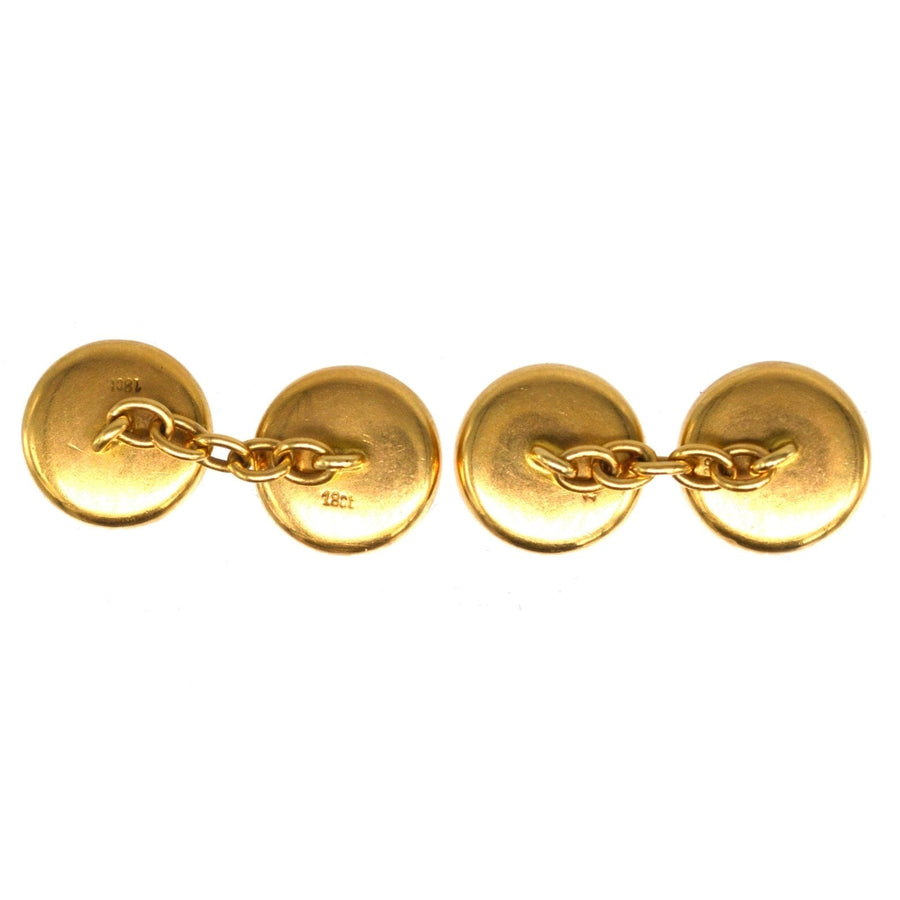 Edwardian 18ct gold cufflinks featuring round button design with chain link.