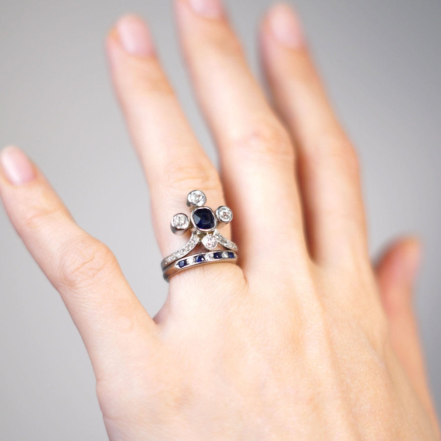 Edwardian 18ct white gold tiara ring featuring sapphire and diamond design, worn on a hand