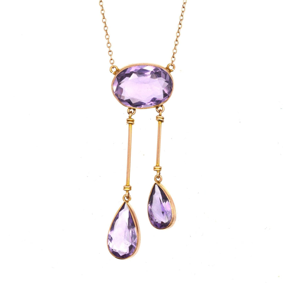Edwardian 9ct gold amethyst double drop necklace with elegant lavender stones, perfect for antique jewelry collections.