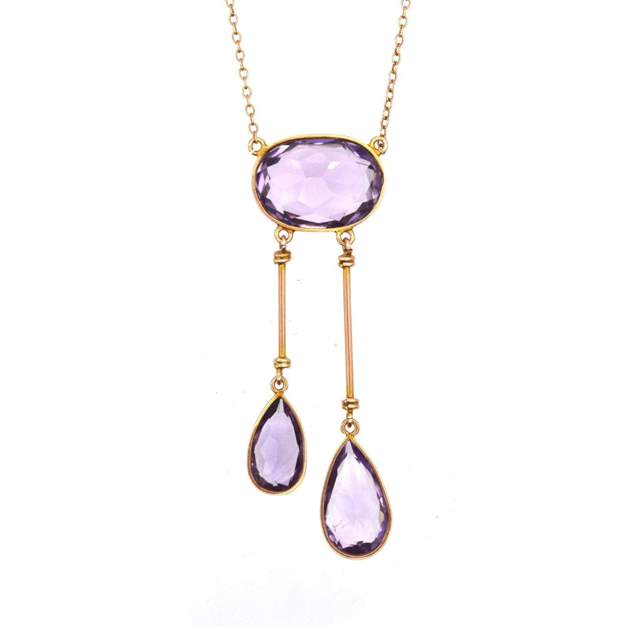 Edwardian 9ct gold amethyst double drop lavalliere necklace with elegant purple stones.