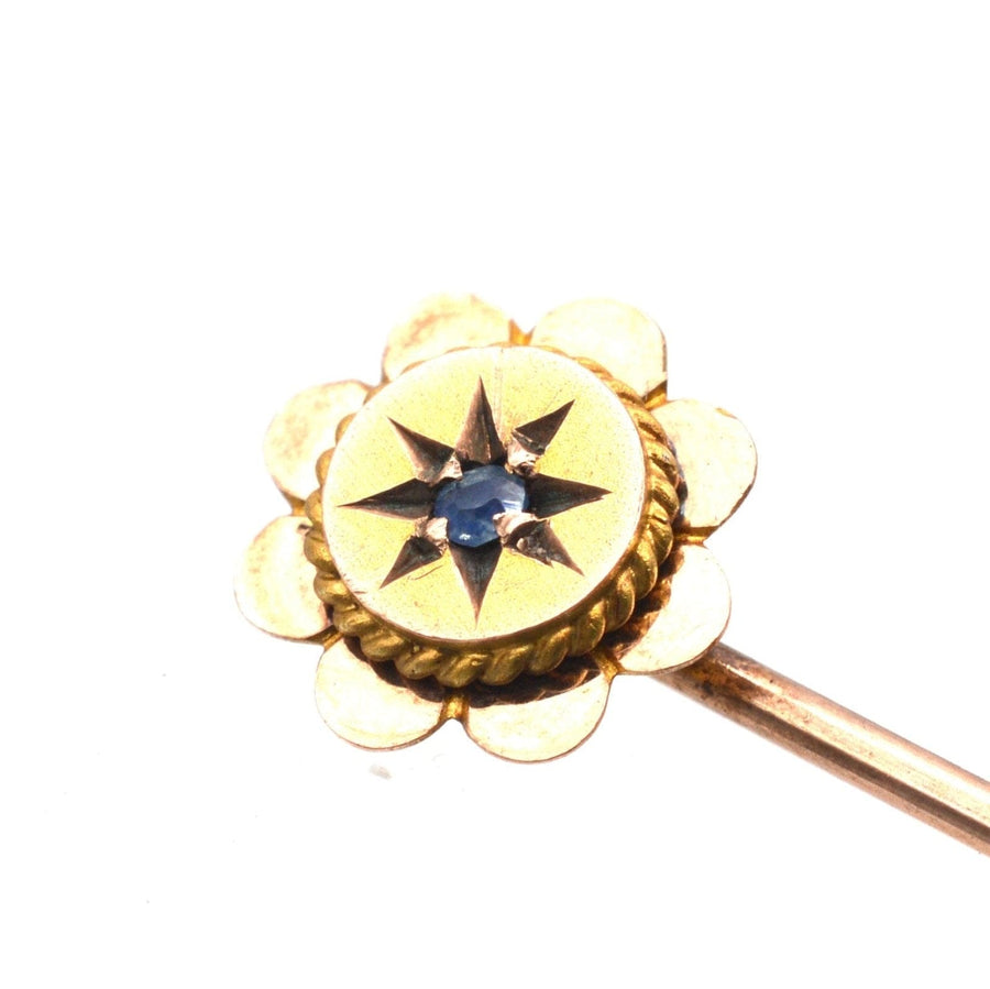 Edwardian 9ct gold flower tie pin with sapphire, decorative stickpin ideal for silk ties.