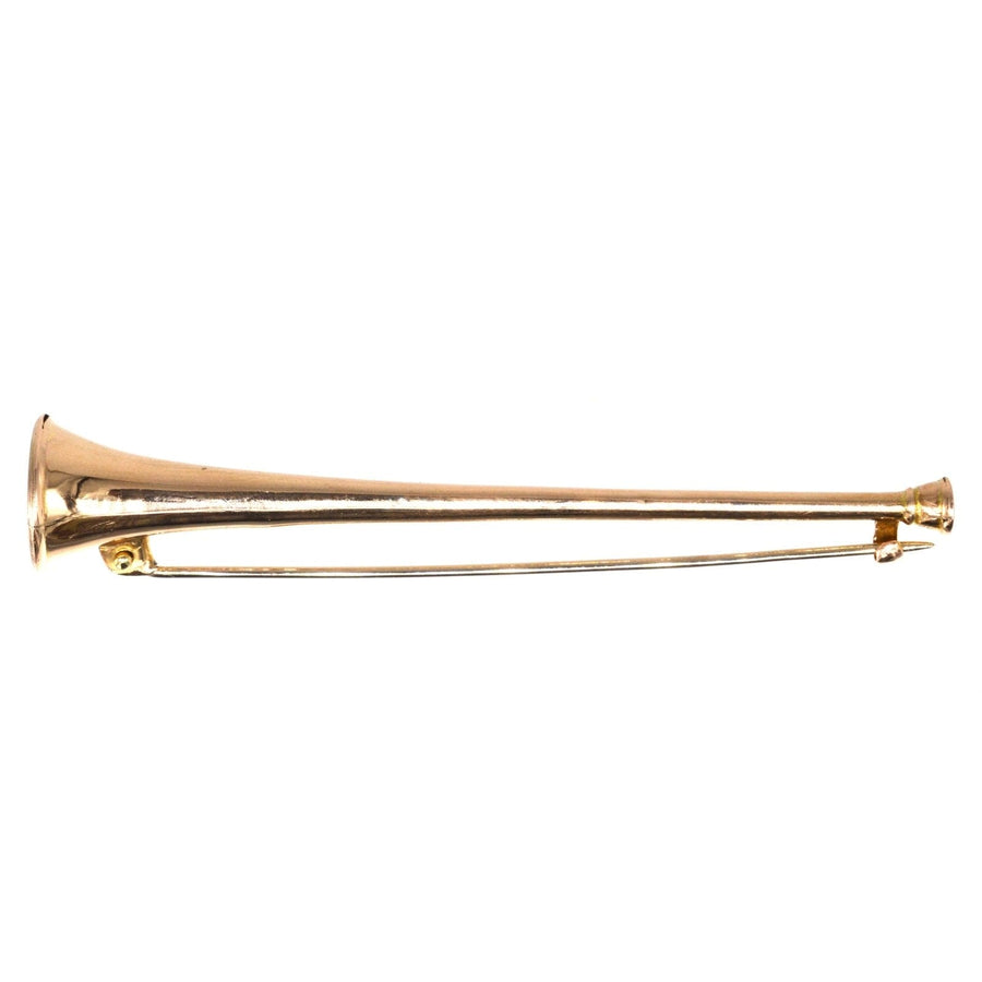Edwardian 9ct gold hunting horn brooch, perfect for lapel or tie, adds quirky charm to any jewelry collection.